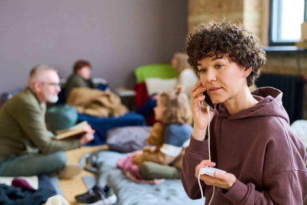 woman talking on phone with portable charger